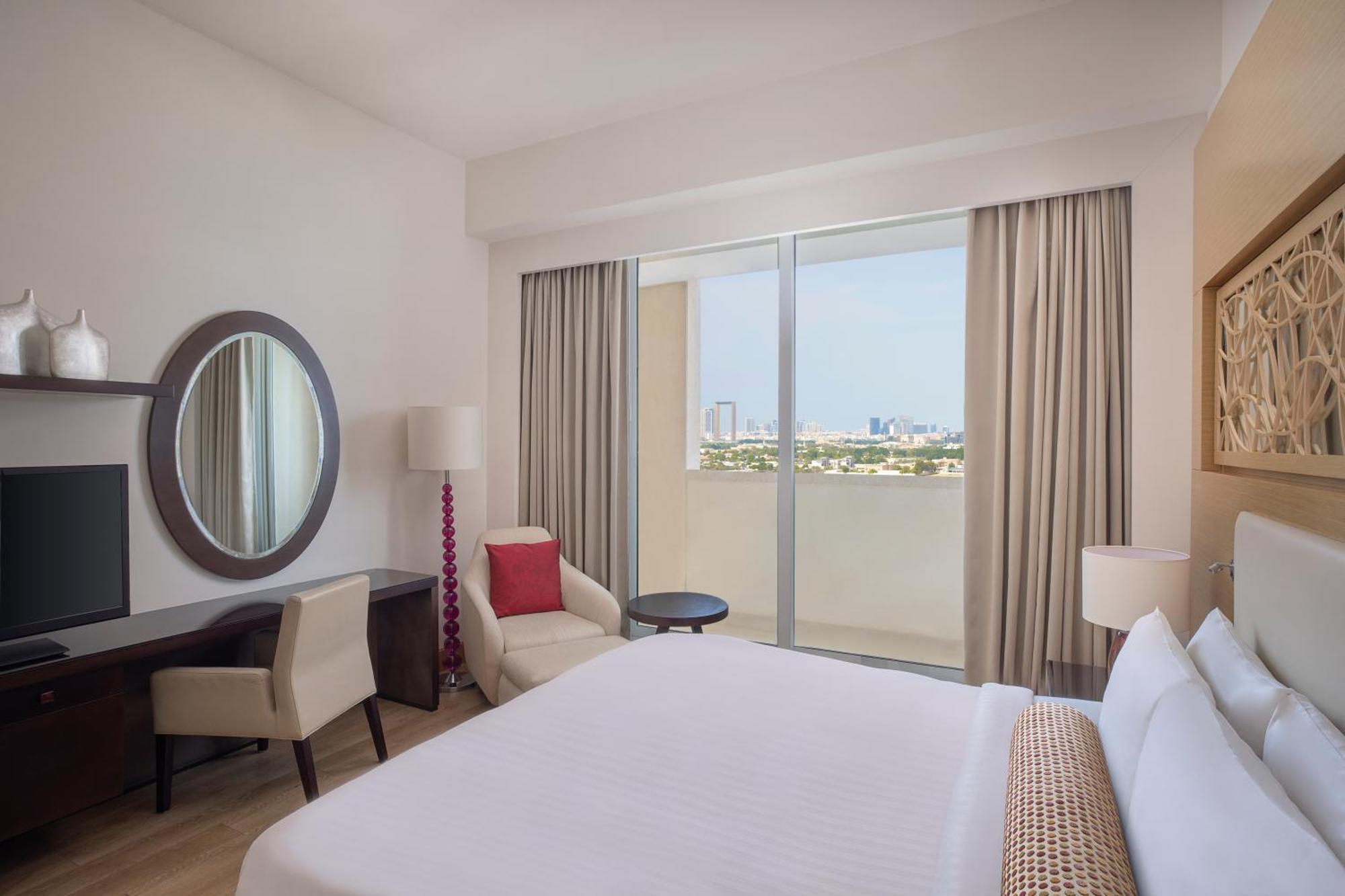 Marriott Executive Apartments Al Jaddaf, Dubaj Kültér fotó A bedroom at the hotel